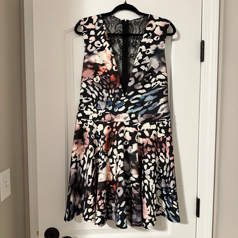 Sexy plunge mini dress with lace back 🔥